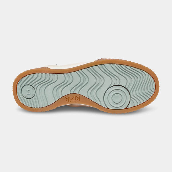 Kizik Brooklyn Ladies slip-on trainers with leather and textile upper, arch support, and rubber sole, designed for comfort and style.