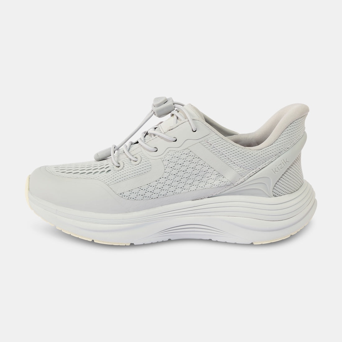 Kizik London Ladies Harbor Mist Leather and Textile Slip-On Trainers with arch support, lightweight design, and textured fabric.