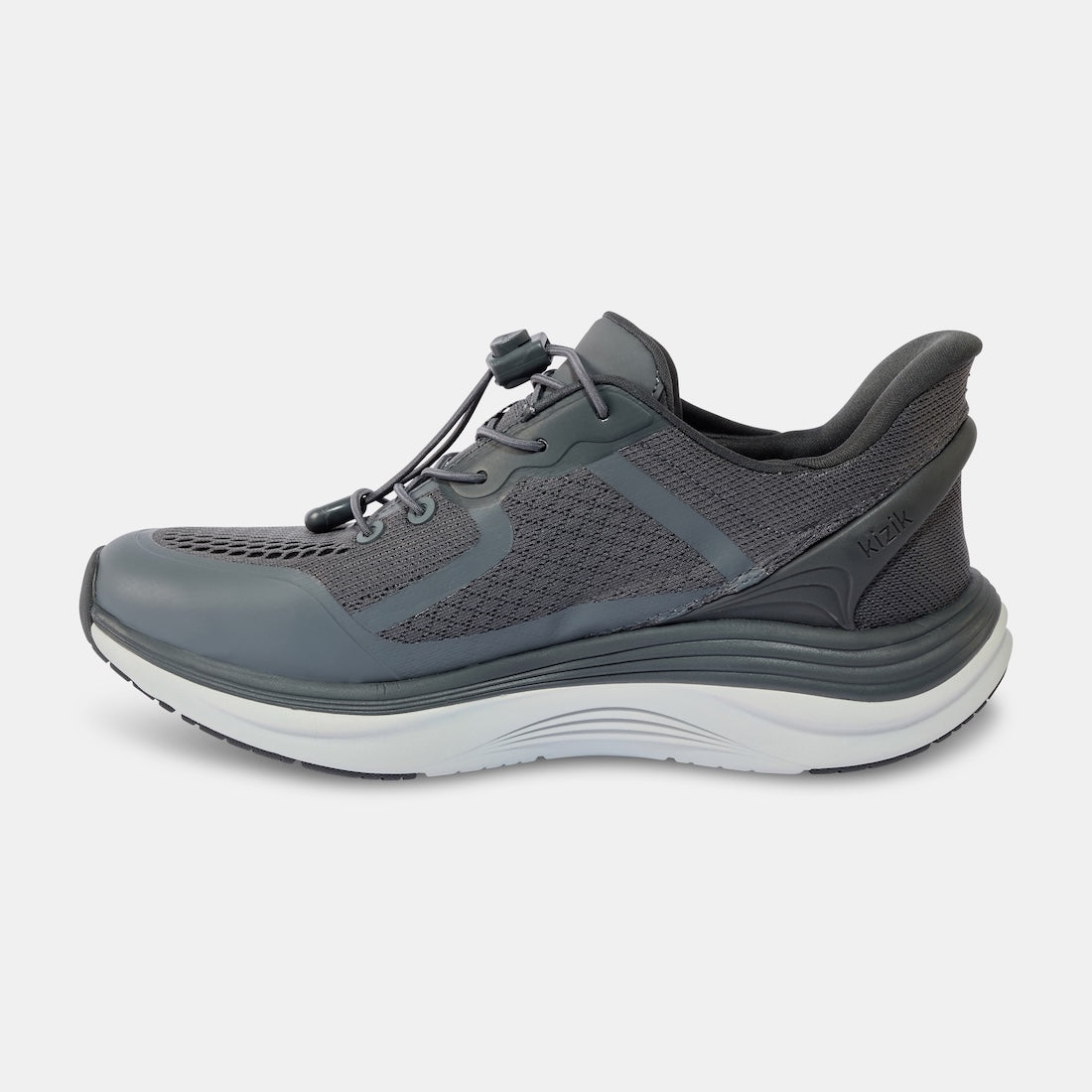Kizik London men's Castlerock leather slip-on trainers with arch support, breathable mesh upper, and cushioned white and gray sole.