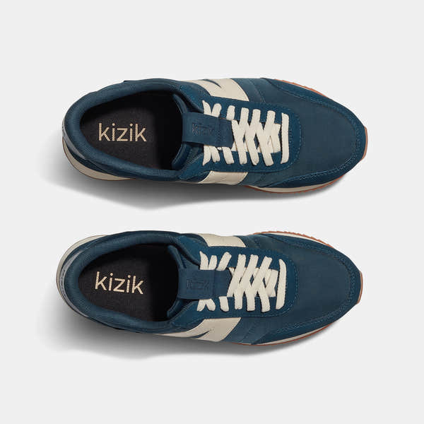 Kizik Milan Unisex Tidepool Leather and Textile Arch Support Slip-On Trainers, blue and beige, with white laces.
