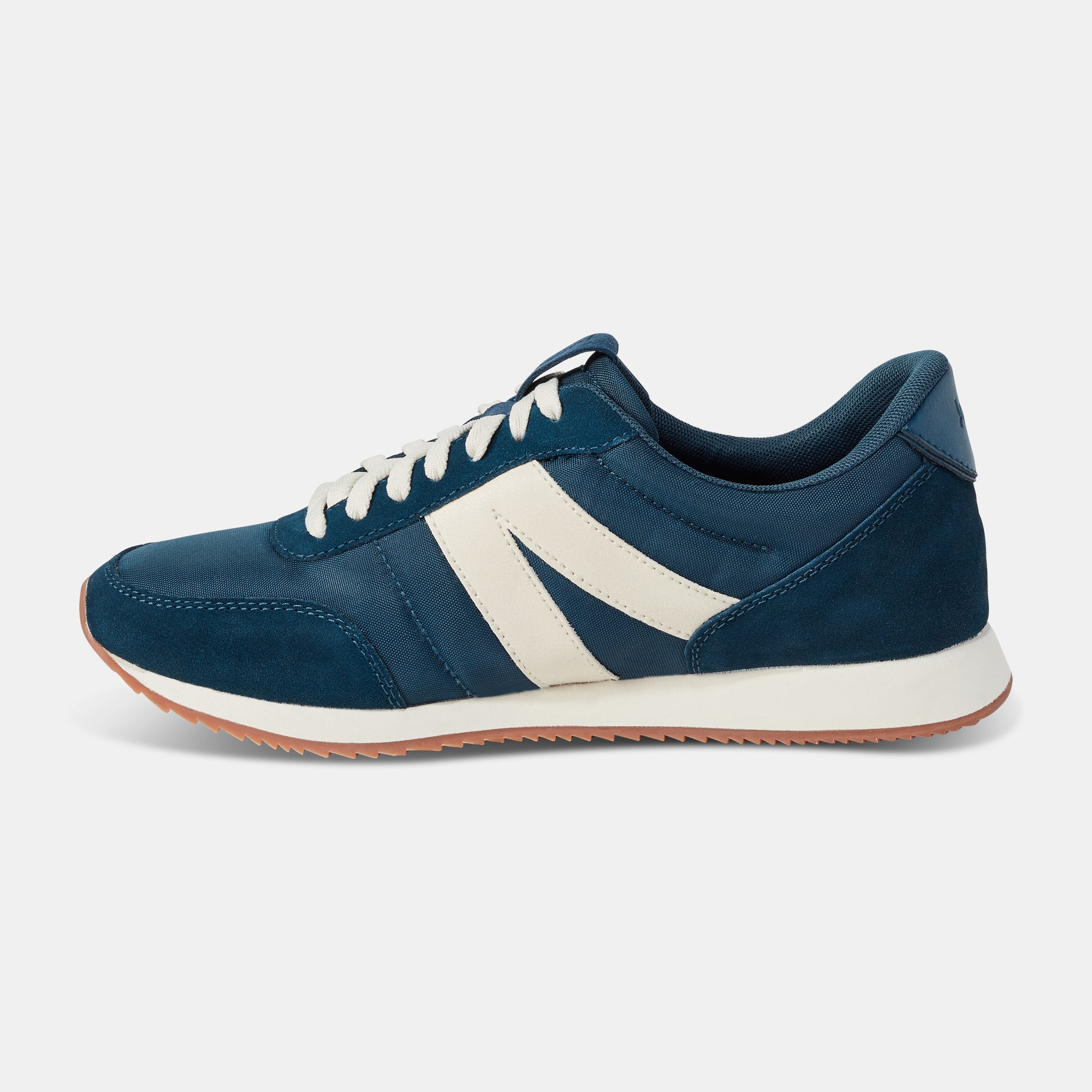 Kizik Milan unisex tidepool leather and textile slip-on trainers with arch support, white accents, and gum rubber outsole.