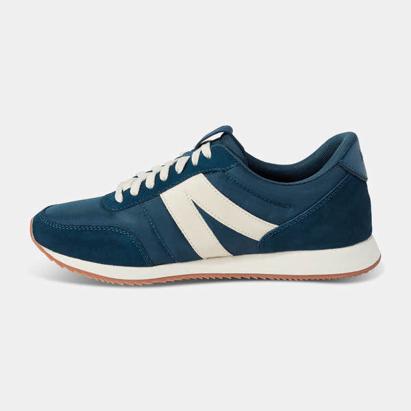 Kizik Milan unisex tidepool leather and textile slip-on trainers with arch support, white accents, and gum rubber outsole.