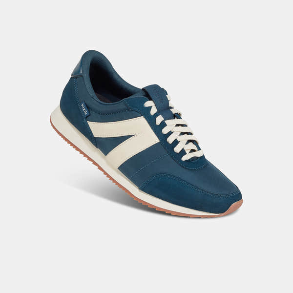 Kizik Milan unisex slip-on trainers with tidepool leather and textile upper, arch support, lace-up design, and non-slip sole.
