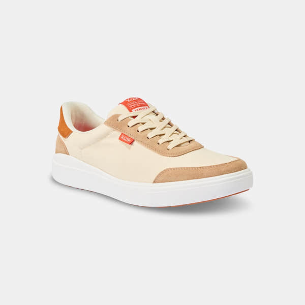 Kizik Prague 2.0 men's slip-on sneakers with white, beige, and gray leather and textile upper, arch support, and white sole.