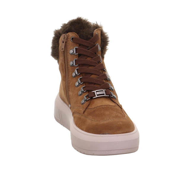 Ladies brown suede waterproof ankle boot with lace and zip closure, faux fur lining, and white rubber sole.