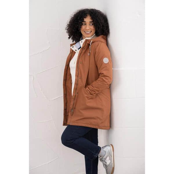 Lighthouse Scarlet Ladies Waterproof Coat in Rust color, featuring a hood, insulated lining, and functional pockets.