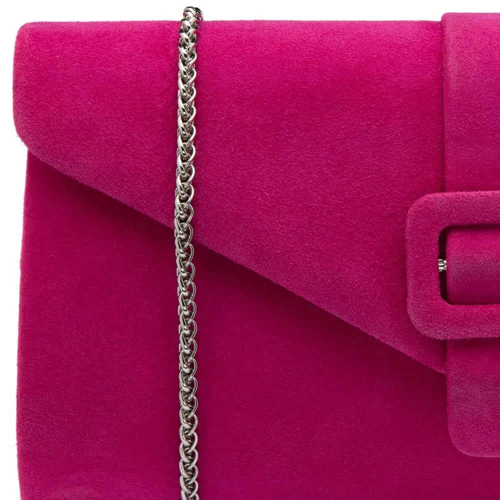 Pink suede Lotus Aletta occasion clutch bag with a silver chain strap and buckle detail. Perfect for elegant evening events.