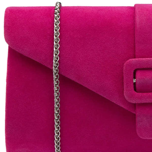 Pink suede Lotus Aletta occasion clutch bag with a silver chain strap and buckle detail. Perfect for elegant evening events.