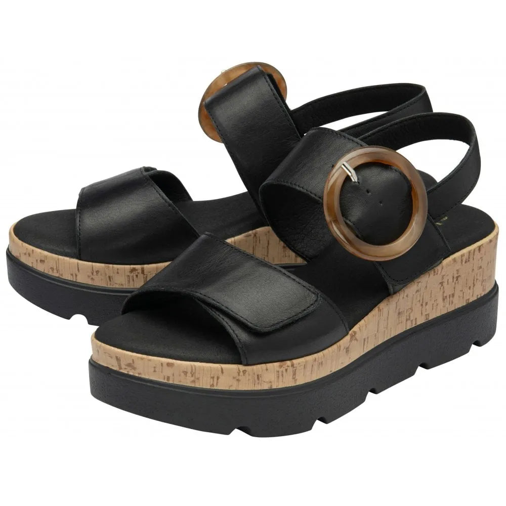 Lotus Cammie Ladies Black Leather Touch Fastening Sandals with cork wedge heel and round buckle strap.