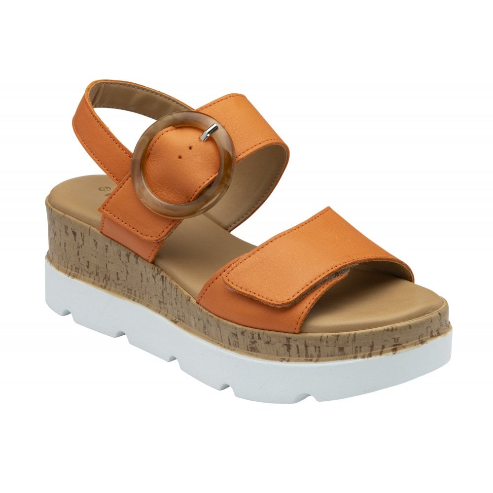 Lotus Cammie ladies orange leather touch fastening sandals with chunky platform sole and decorative circular buckle.