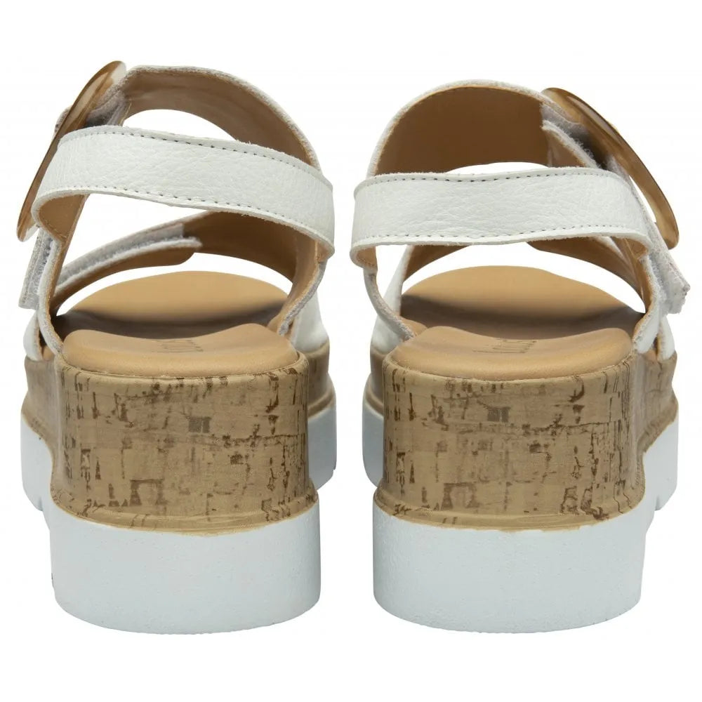 Lotus Cammie women's white leather touch fastening sandals with chunky cork platform sole and white rubber heel.