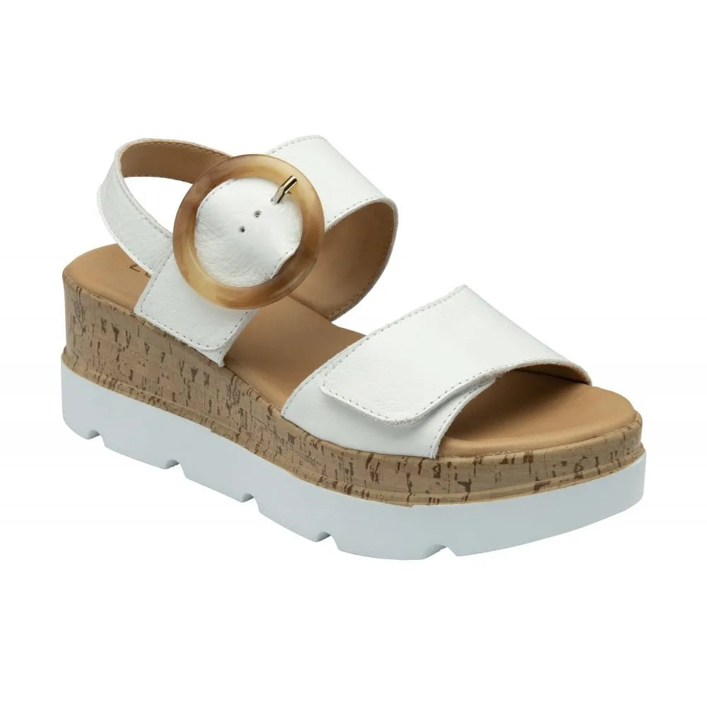 Lotus Cammie ladies white leather touch fastening sandals with cork-textured wedge sole and adjustable ankle strap.
