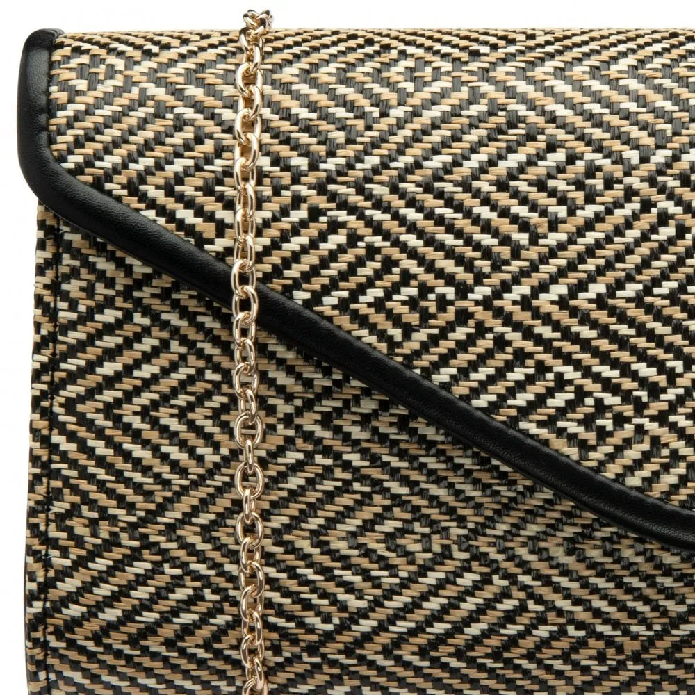 Lotus Chariot Black Clutch Bag with geometric woven pattern, gold chain strap, and black leather trim. Elegant and stylish accessory.