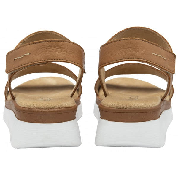 Lotus Facchini women's tan leather slingback sandals with wide straps and white platform soles.