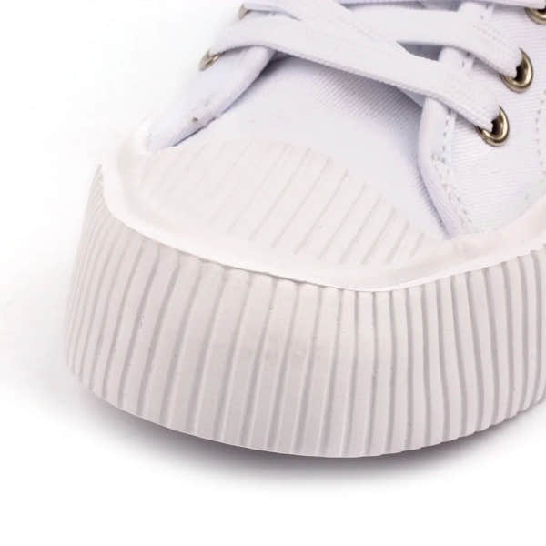 Lunar DLA009 Jayne III white lace-up women's trainers with ribbed rubber toe cap and sole detail.