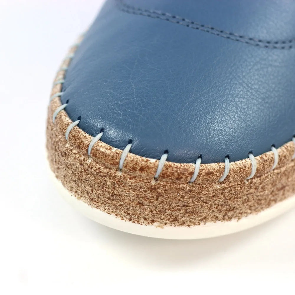 Lunar FLE050 Evie ladies' mid blue leather shoes with elasticated detail and a textured rubber sole.