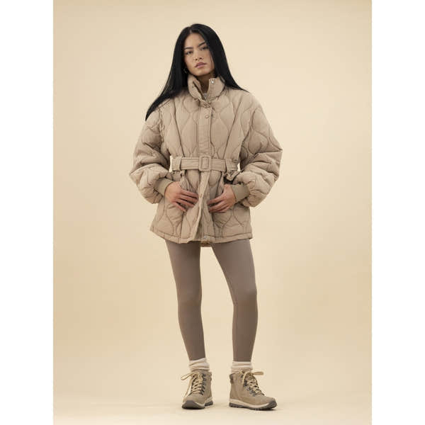 Lunar GLB132 Jett Stone waterproof women's winter boots, beige, rugged soles, stylish padded quilted jacket, modeling outdoor footwear.