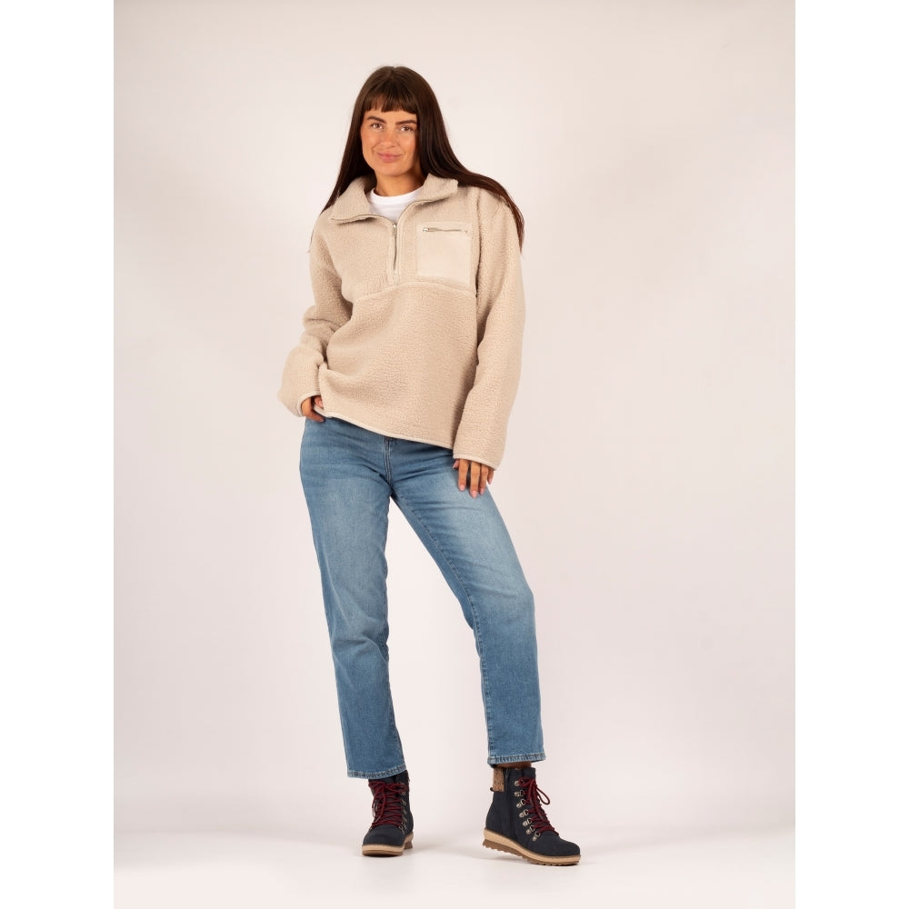 Lunar GLB205 Candy Ladies Navy Waterproof Zip & Lace Ankle Boots with rugged sole, ideal for winter, paired with casual outfit.
