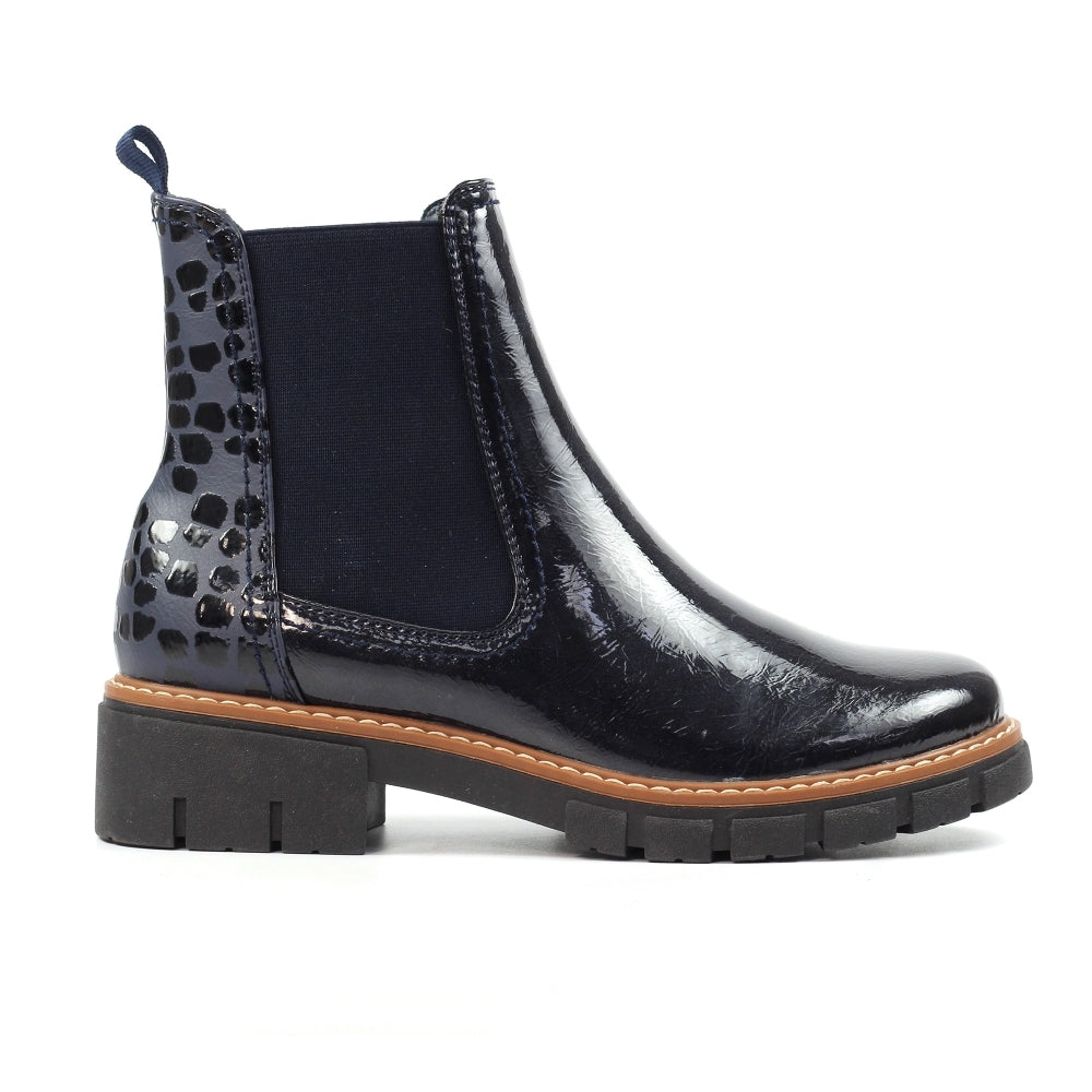 Lunar GLB222 Peace Ladies Navy Pull-On Ankle Boots, shiny patent finish with leopard-print heel tab, rubber sole, and elastic sides.
