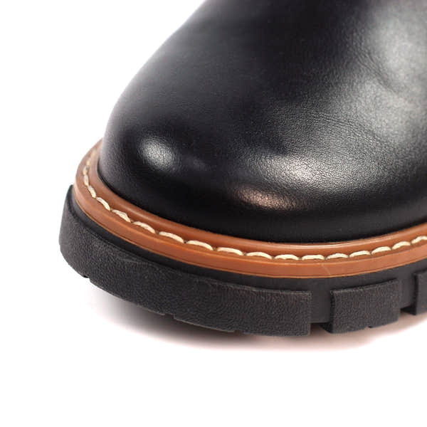 Lunar GLB225 Ribble Ladies Black Ankle Pull-On Boots, close-up of smooth black leather toe, brown welt, and rugged black sole.