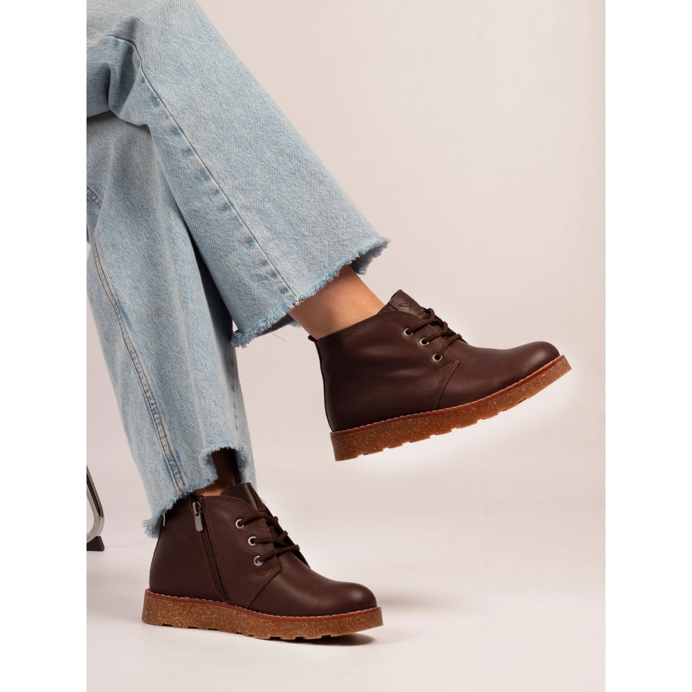 Lunar GLR126 Claire III Women's Brown Leather Zip & Lace Ankle Boots with gum sole, styled with light-wash cropped jeans.