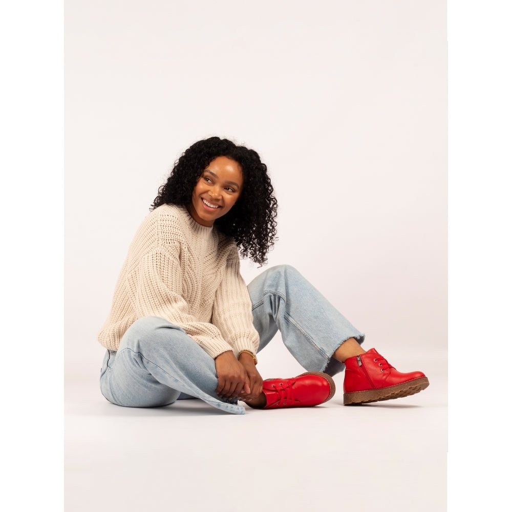 Lunar GLR126 Claire III women's red leather ankle boots with zip and lace-up design, chunky sole, styled with light jeans and beige sweater.