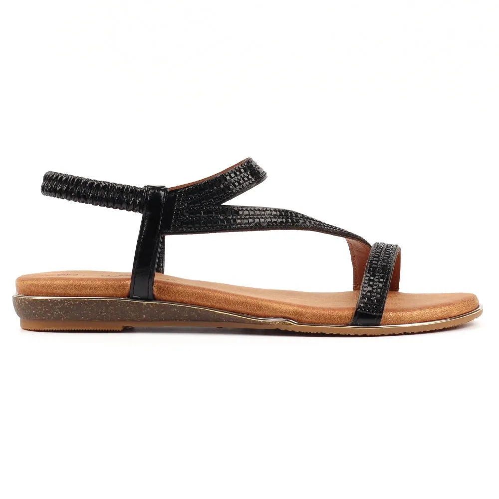Lunar JLH321 Blaise II women's black elasticated slip-on sandals with textured straps and flat sole.