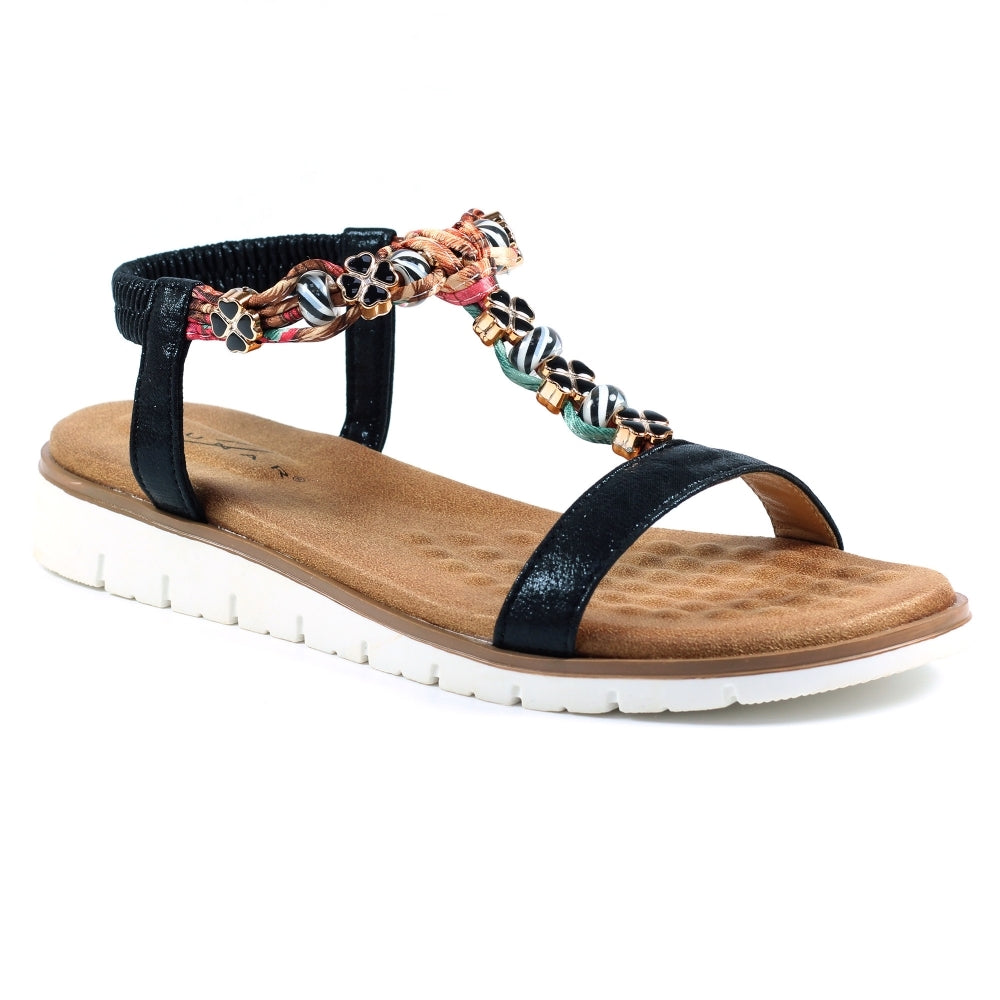 Lunar JLH363 Tempo Ladies Black Elasticated Sandals with beaded and floral decorative straps, cushioned footbed, and white rubber sole.