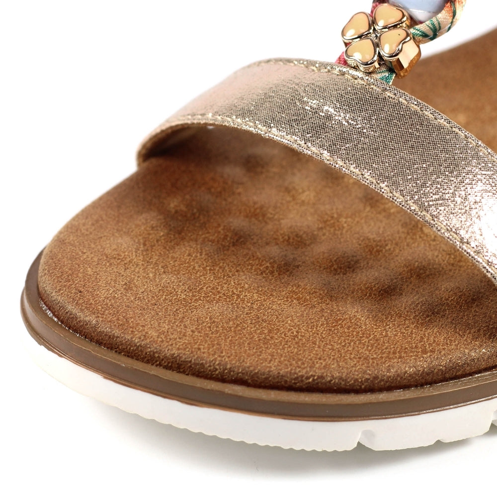Lunar JLH363 Tempo Ladies Gold Elasticated Sandals, cushioned brown footbed, metallic strap, and decorative floral embellishment.