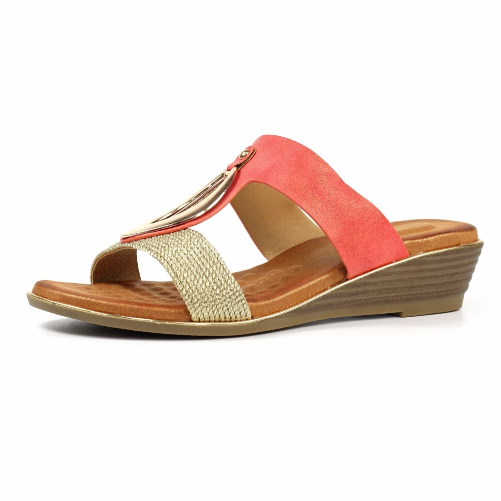 Lunar JLH434 Porto Ladies Coral Slip-On Mules with beige strap and decorative buckle, cushioned footbed, and wedge heel.