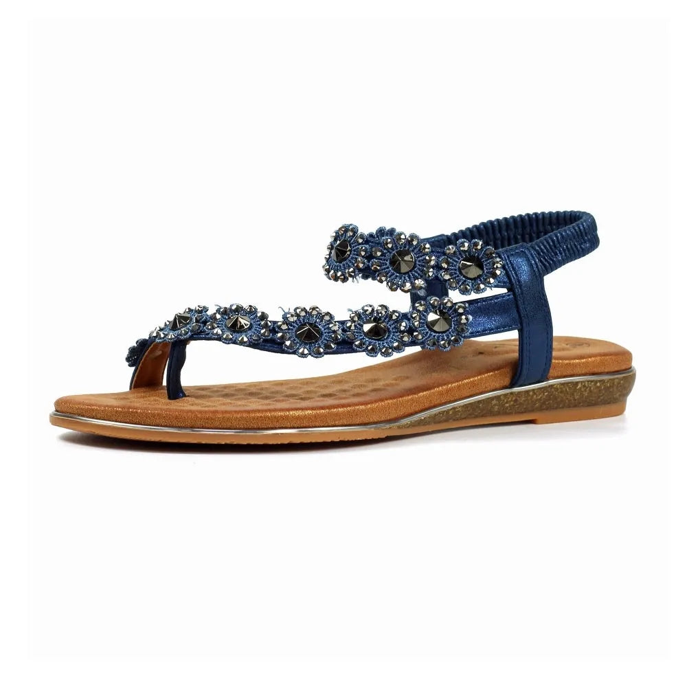 Lunar JLH455 Charlotte II Ladies Navy Sandals with elasticated strap and jeweled floral embellishments, flat cushioned sole.