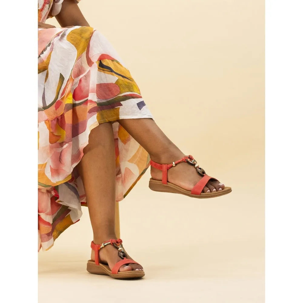 Lunar JLH475 Brava Ladies Orange Elasticated Sandals with chain detail, flat sole, and ankle strap.