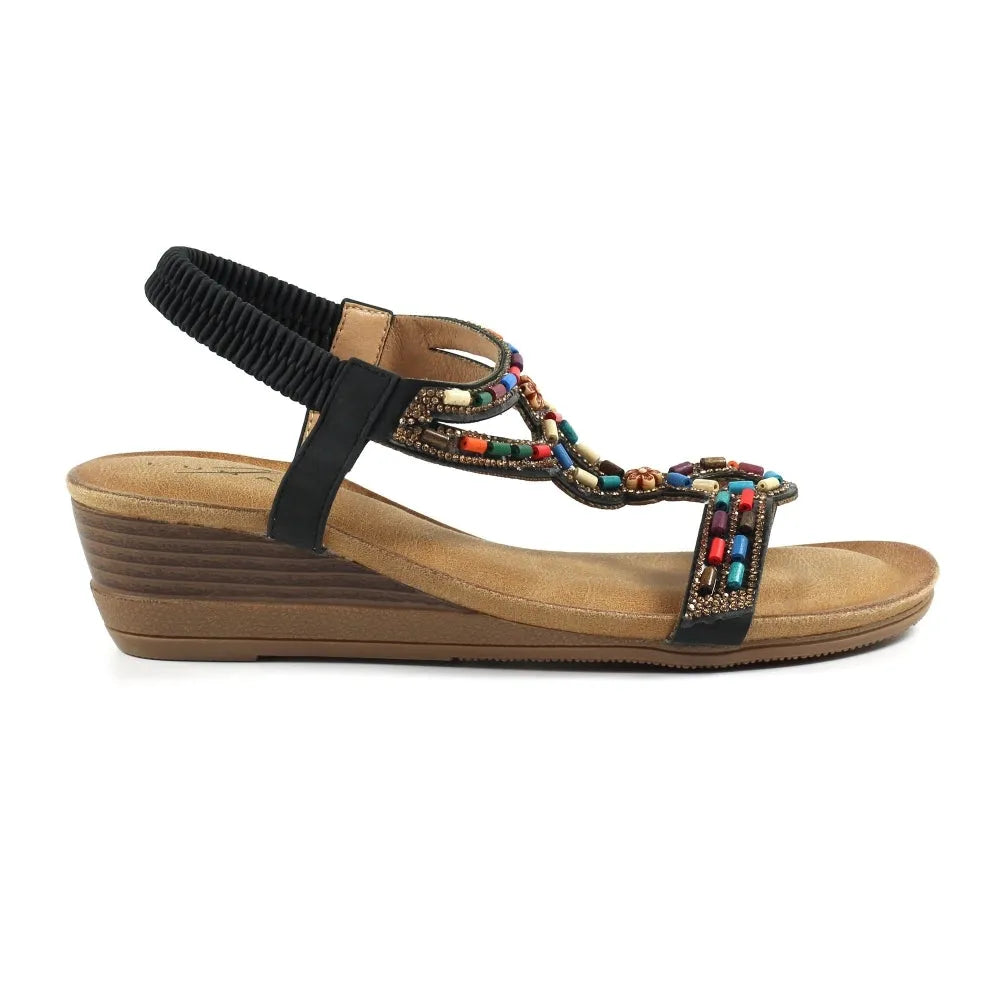 Lunar JLH478 Epsom Ladies Black Elasticated Sandals with beaded straps, low wedge heel, and open-toe design.