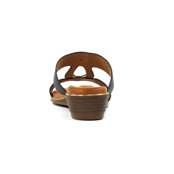 Black slip-on mule sandals with a low stacked heel, leather upper, and cushioned insole.