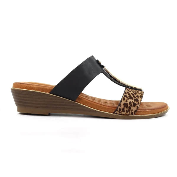 Black slip-on mules with leopard print accents and a stylish wedge heel, featuring comfortable cushioned insoles.