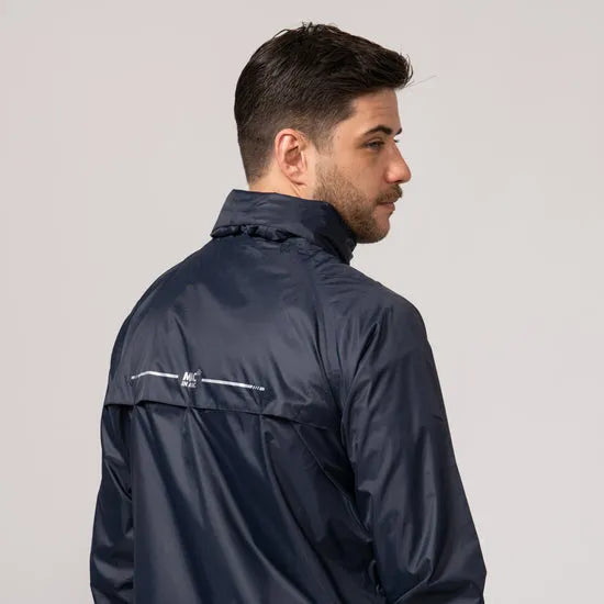 Unisex navy Mac In A Sac Mias Origin 2 jacket shown from behind on a man, lightweight, water-resistant, stylish outdoor windbreaker.