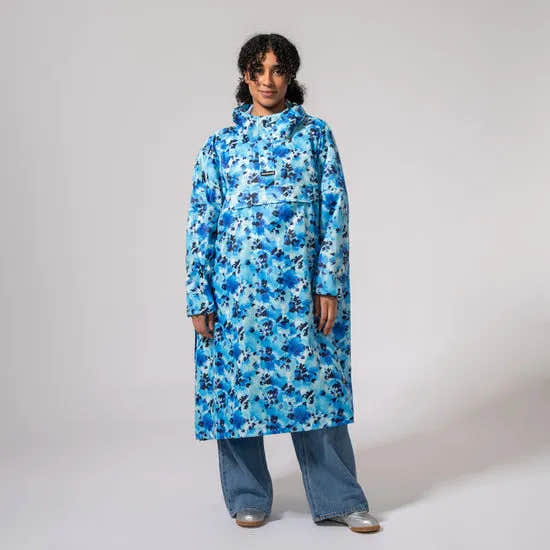 Unisex blue floral festival poncho, waterproof, mid-length raincoat with hood, casual style, oversized fit.