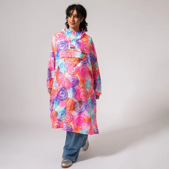 Unisex tie-dye festival poncho with vibrant, colorful spiral patterns, featuring a hood and front pocket, perfect for festival wear.