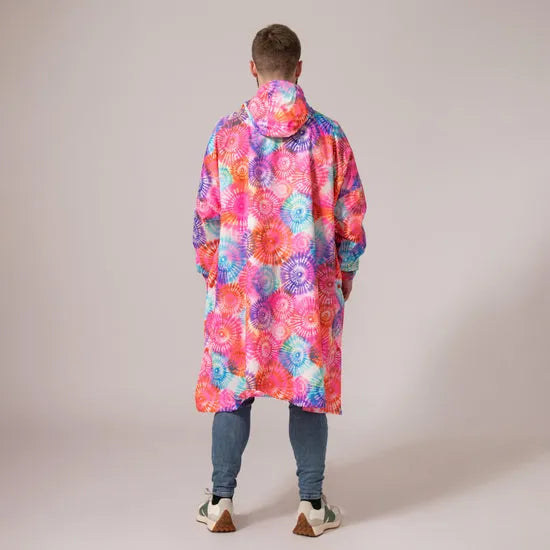 Unisex festival poncho in tie-dye with vibrant, colorful spiral patterns, featuring a hood and relaxed fit.