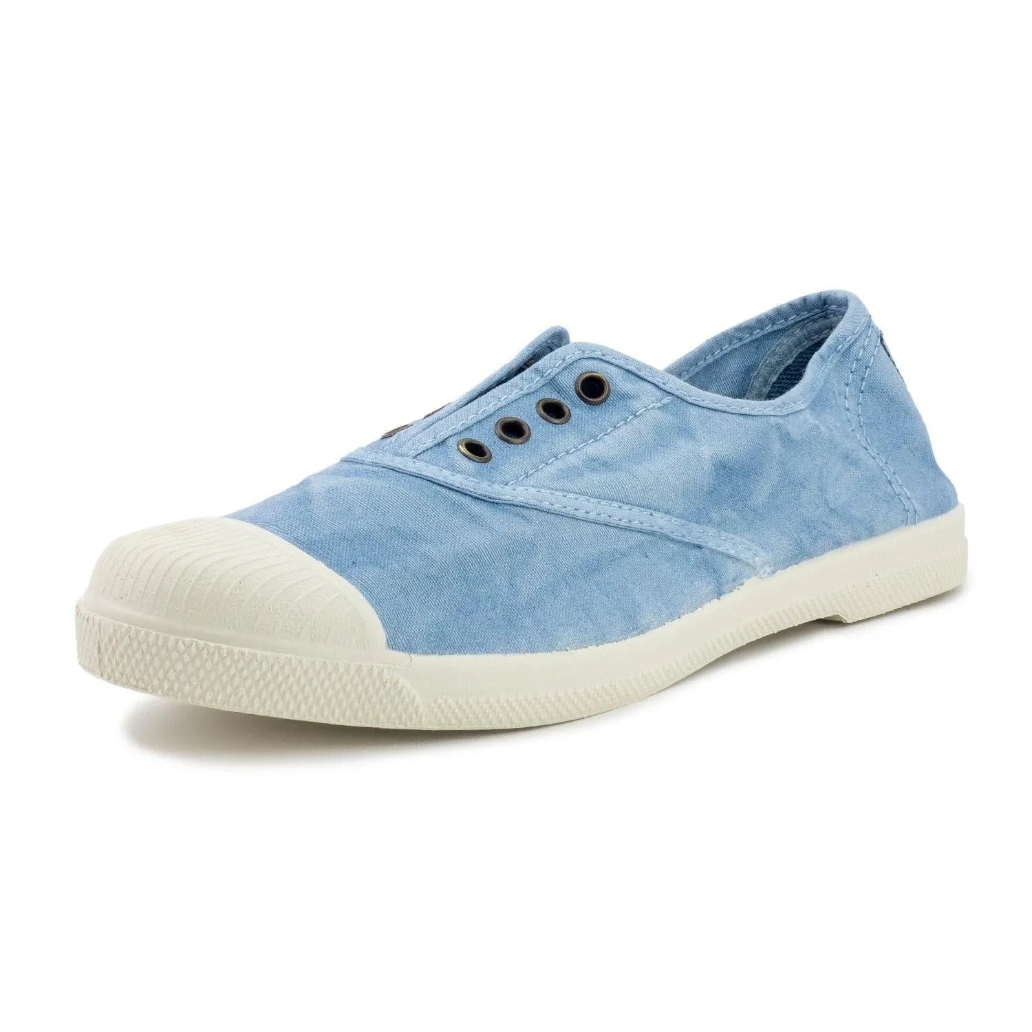 Ladies vegan slip-on shoes with blue textile upper, white rubber toe cap, and textured sole.