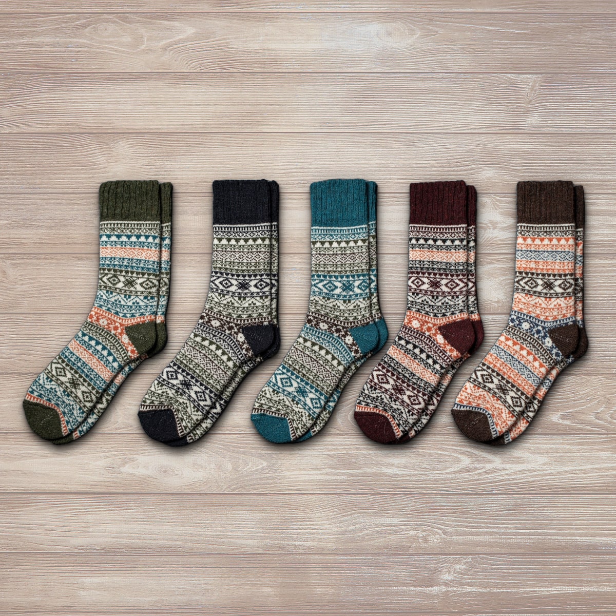 Unisex Nordic wool socks in burgundy, blue, black, green, and brown with traditional Nordic patterns.