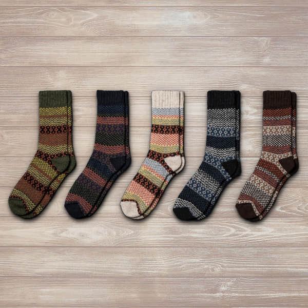 Unisex Nordic Wool Socks in various colorful striped and patterned designs, labeled "Tore" in brown, size medium.