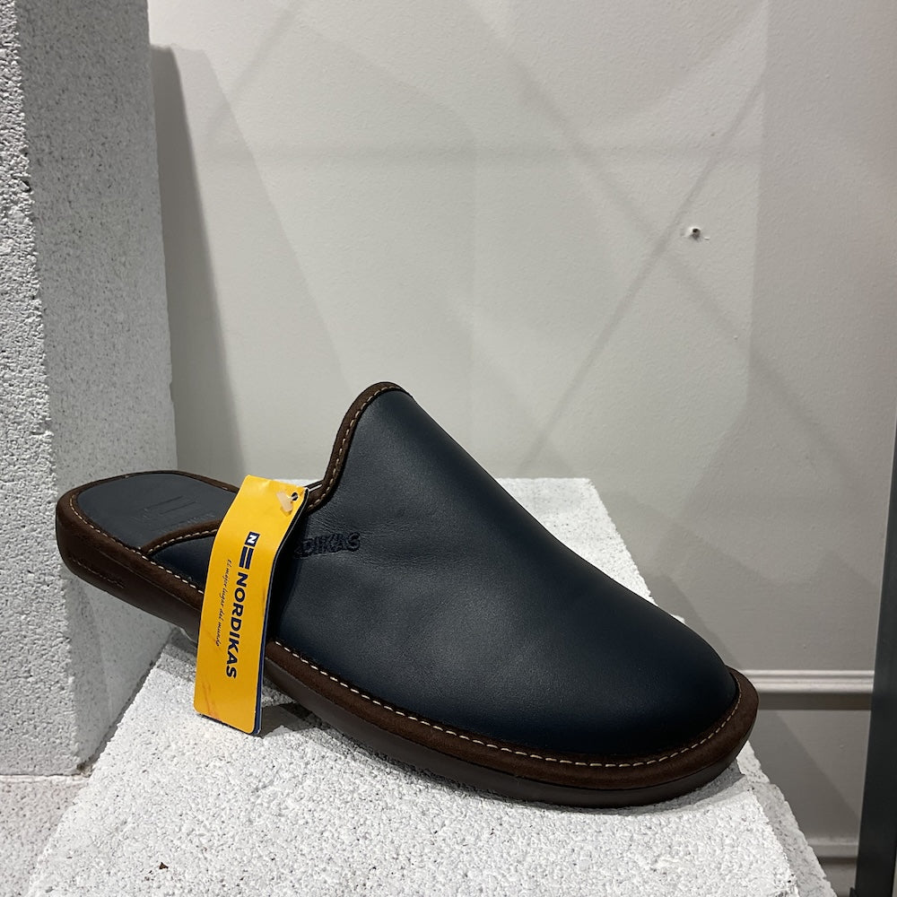 Nordikas 131 men's Spanish navy leather slip-on mules with brown sole and yellow tag.