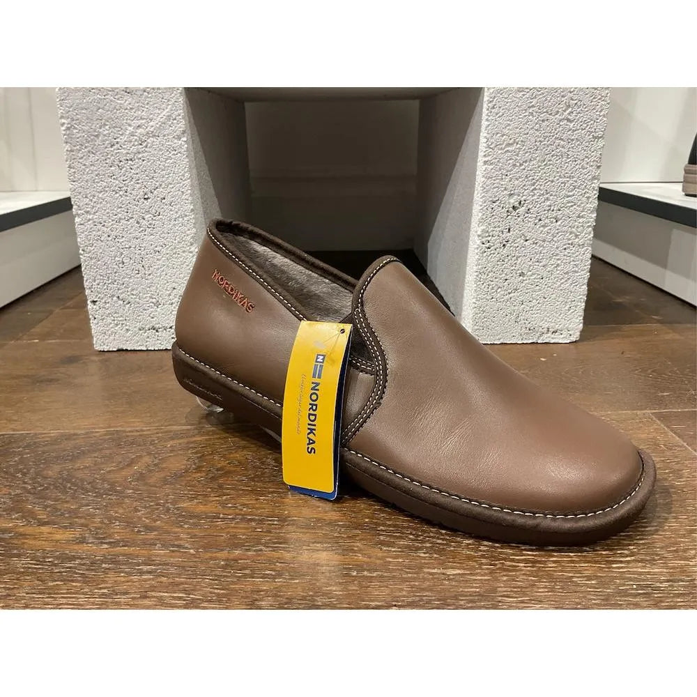 Nordikas men's Spanish brown leather slip-on slippers with padded interior and stitched sole, stylish and comfortable footwear.