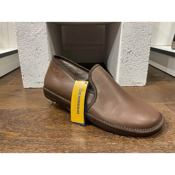 Nordikas men's Spanish brown leather slip-on slippers with padded interior and stitched sole, stylish and comfortable footwear.