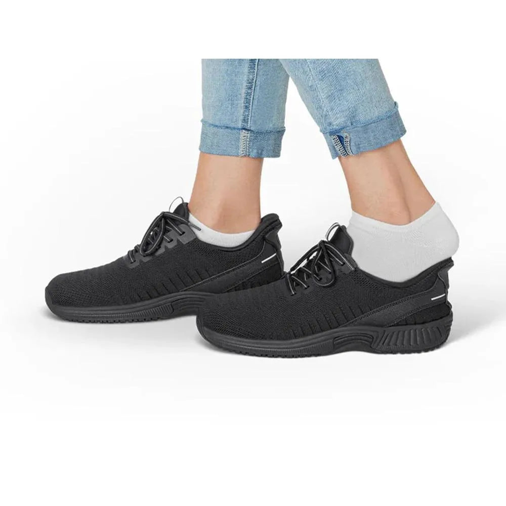 OrthoFeet Kita Ladies black textile arch support trainers with wide elasticated fit, designed for comfort and extra support.