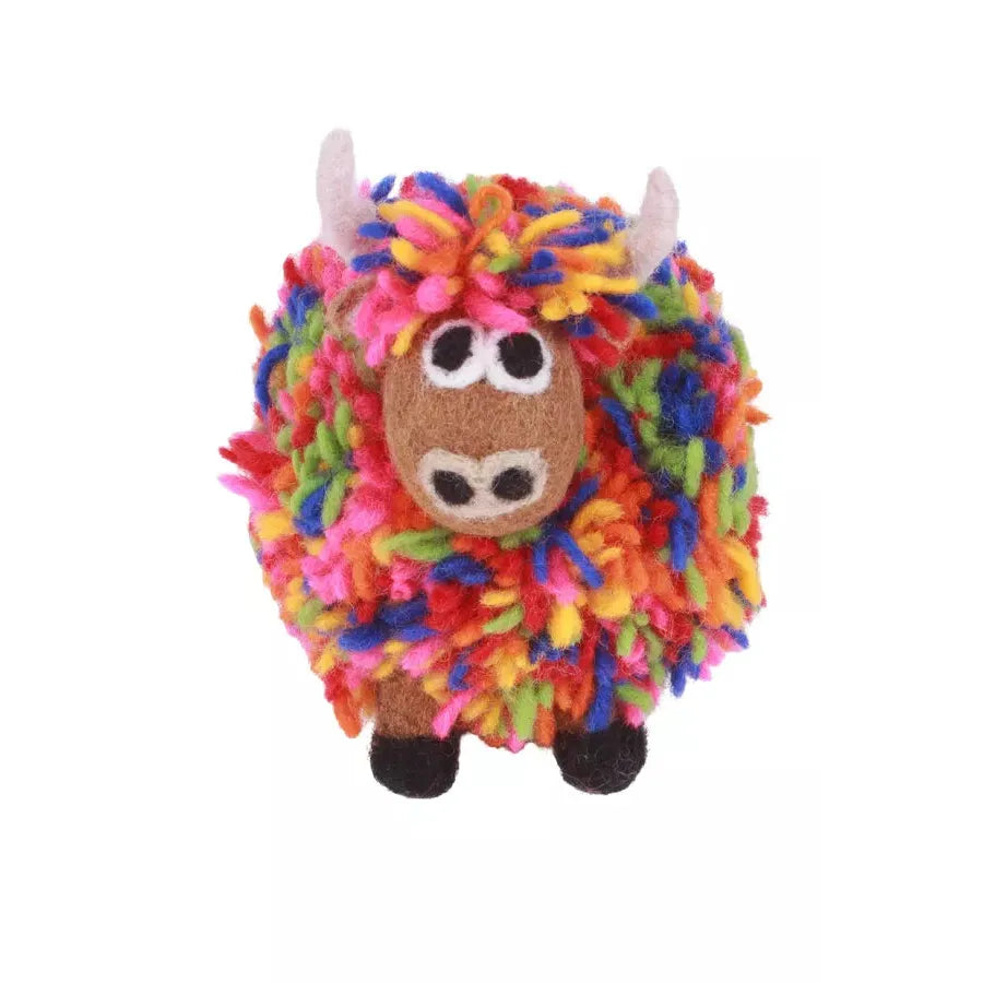 Pachamama Archie Highland Cow plush toy with colorful, curly yarn fur, white horns, large eyes, and black hooves.