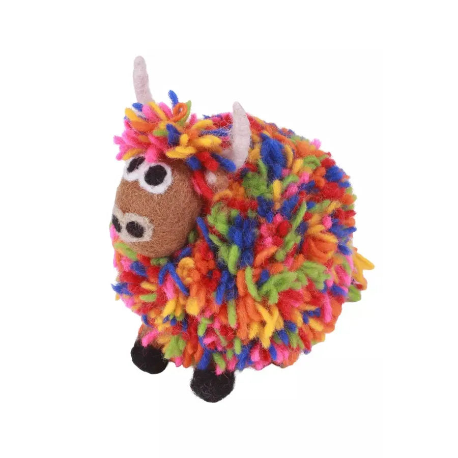 Pachamama Archie Highland Cow plush toy with colorful yarn blanket and embroidered features.