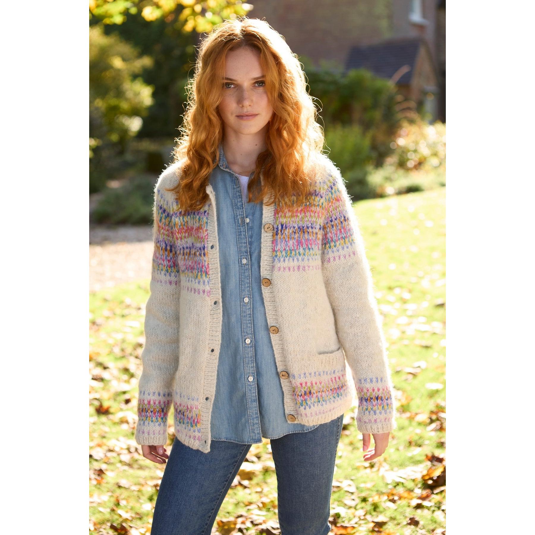 Woman wearing Pachamama Arundel Cardigan in Oatmeal, knit sweater with colorful patterned yoke, casual fall outfit.