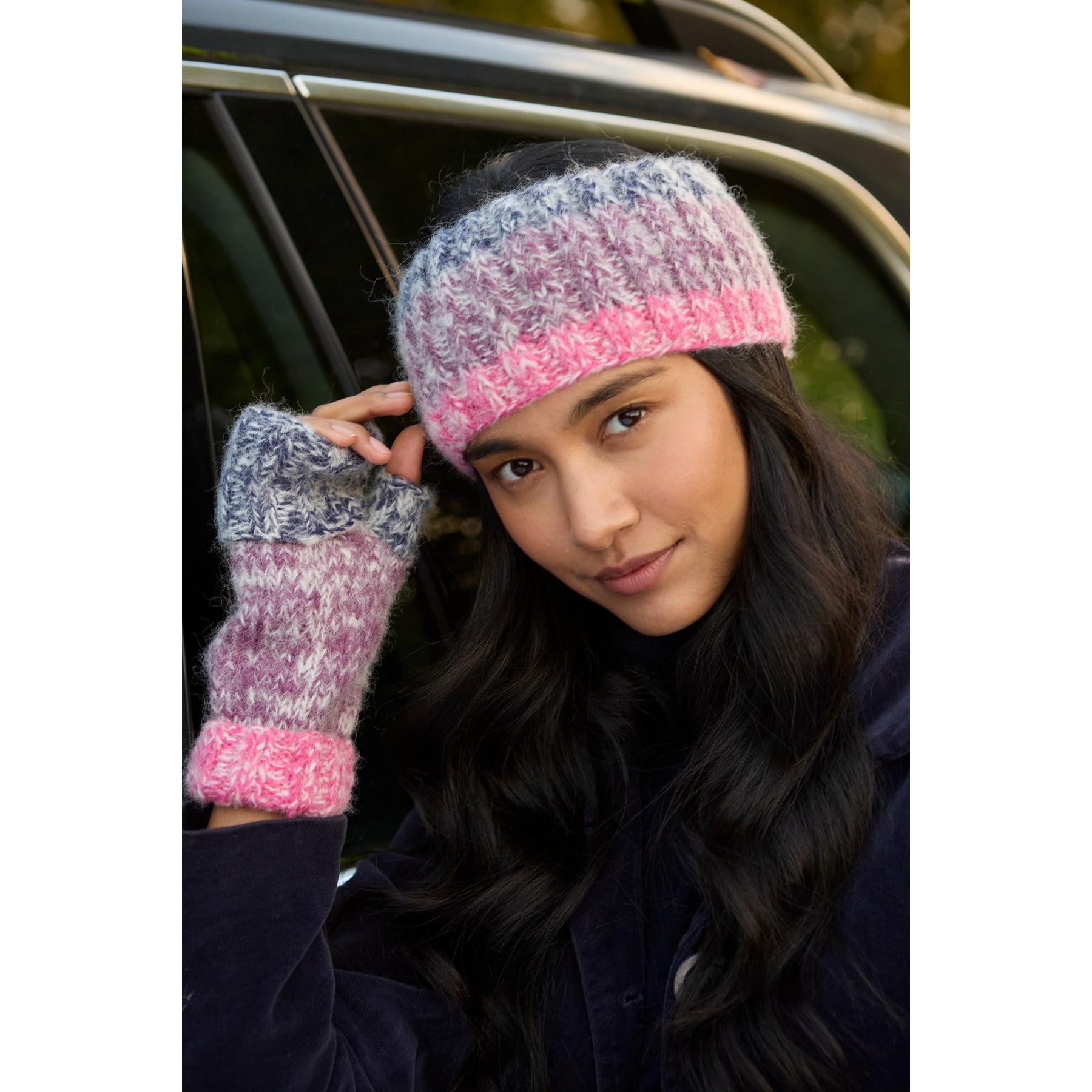 Pachamama Berlin purple handwarmer set with matching knit hat, features a colorful gradient design and cozy textured pattern.